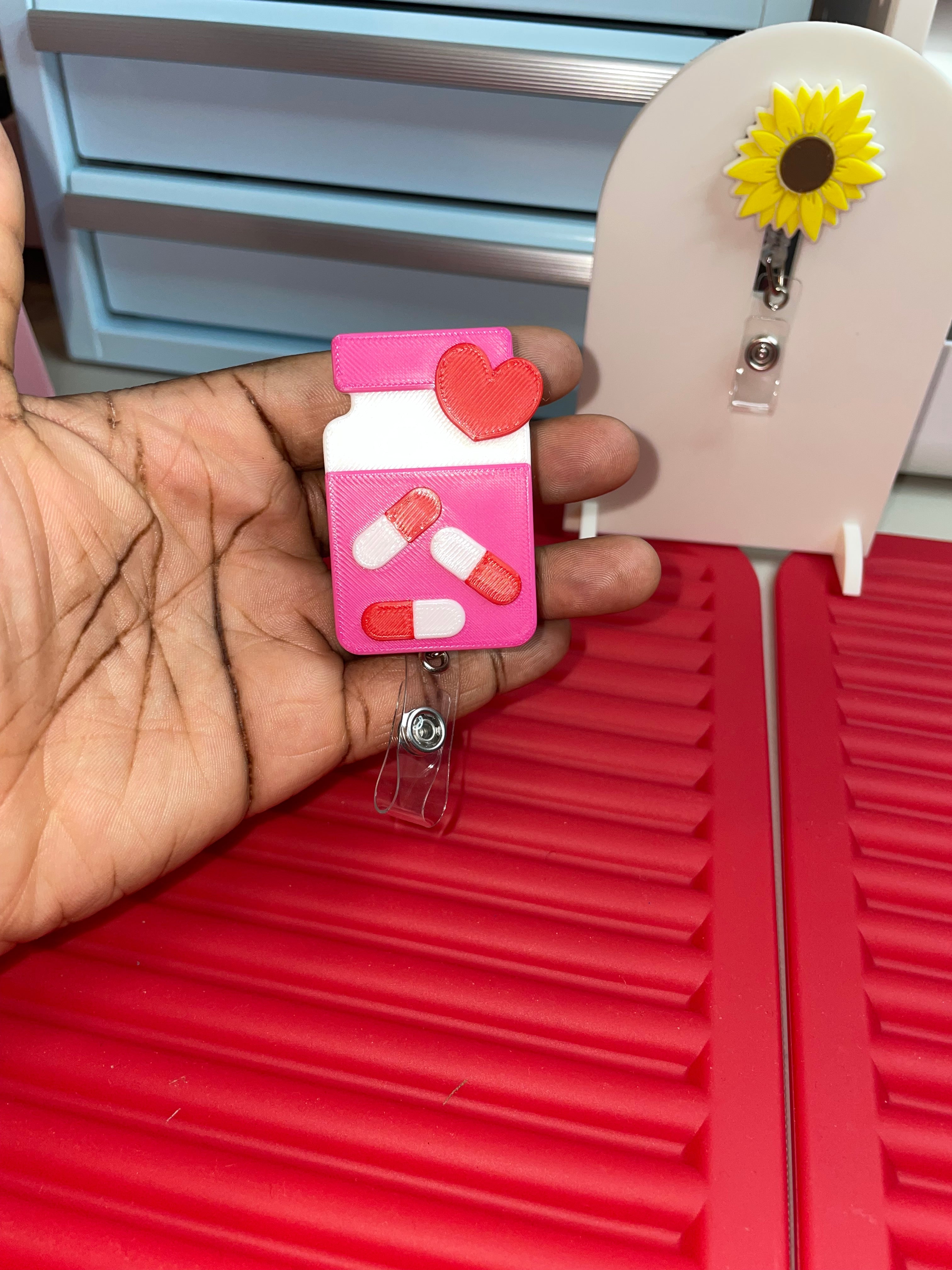 Pill bottle reel badge holder