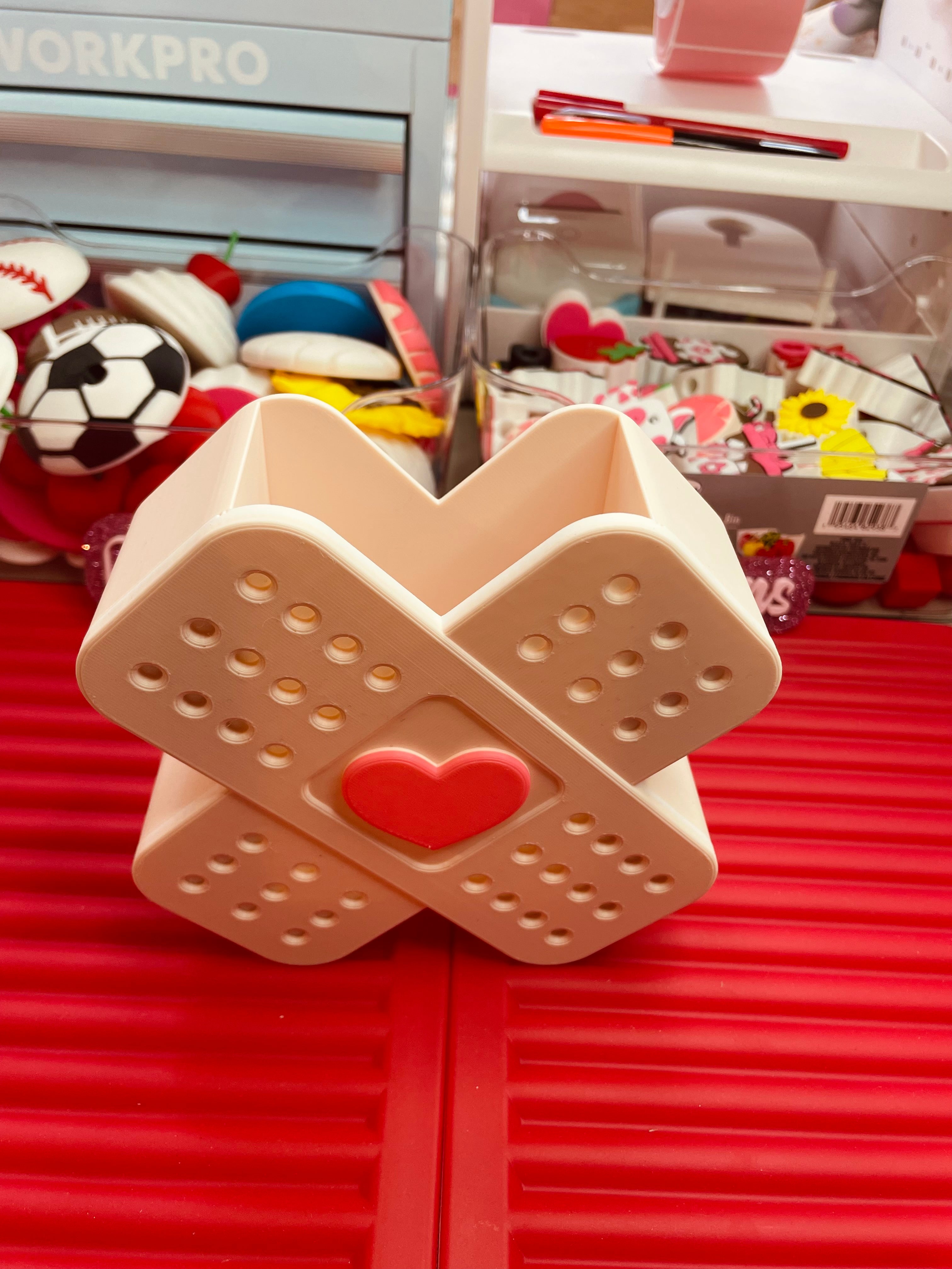 Heart bandage pen/pencil holder