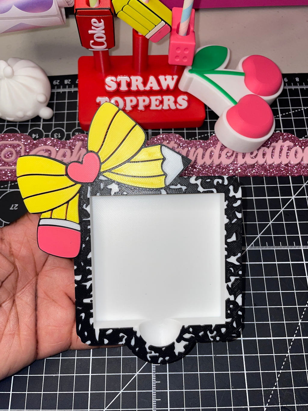 Pencil bow composition sticky note holder