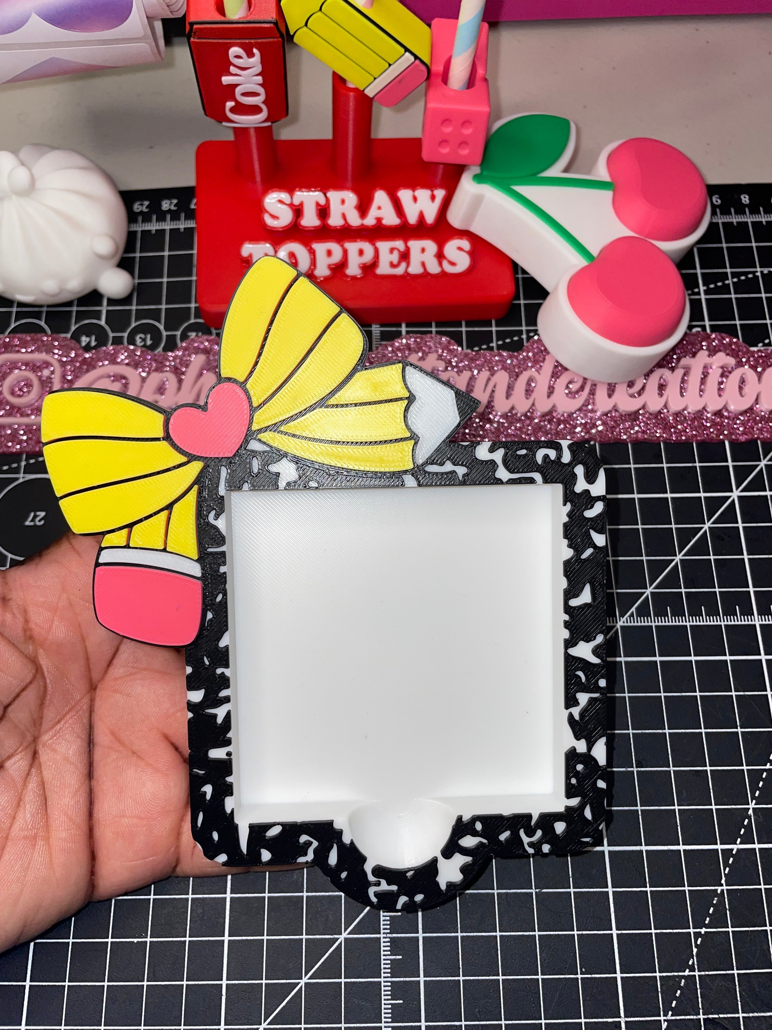 Pencil bow composition sticky note holder