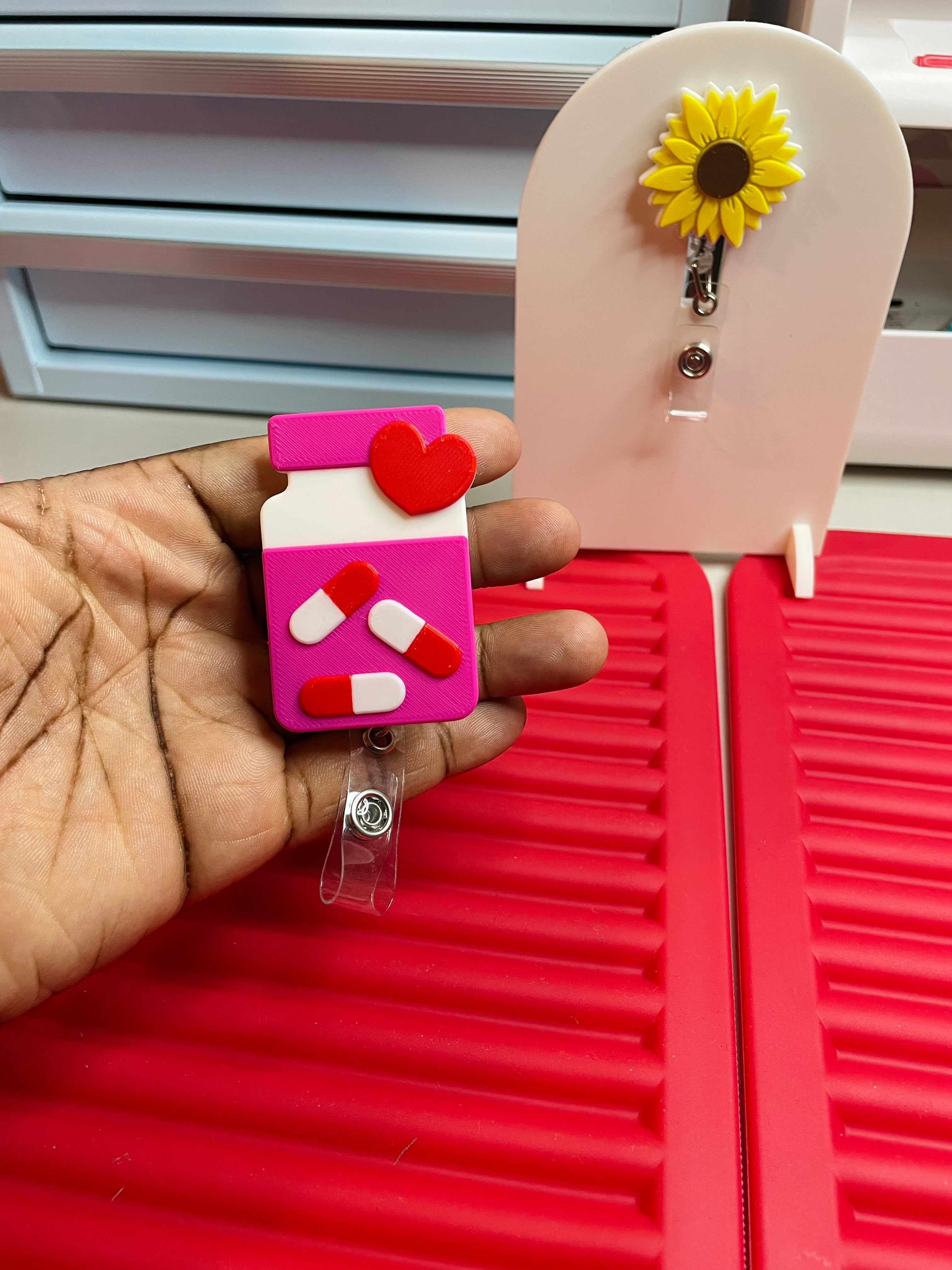 Pill bottle reel badge holder
