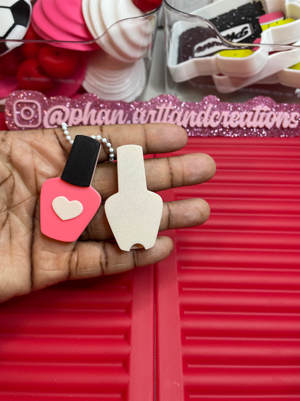 Nail polish can opener/keychain