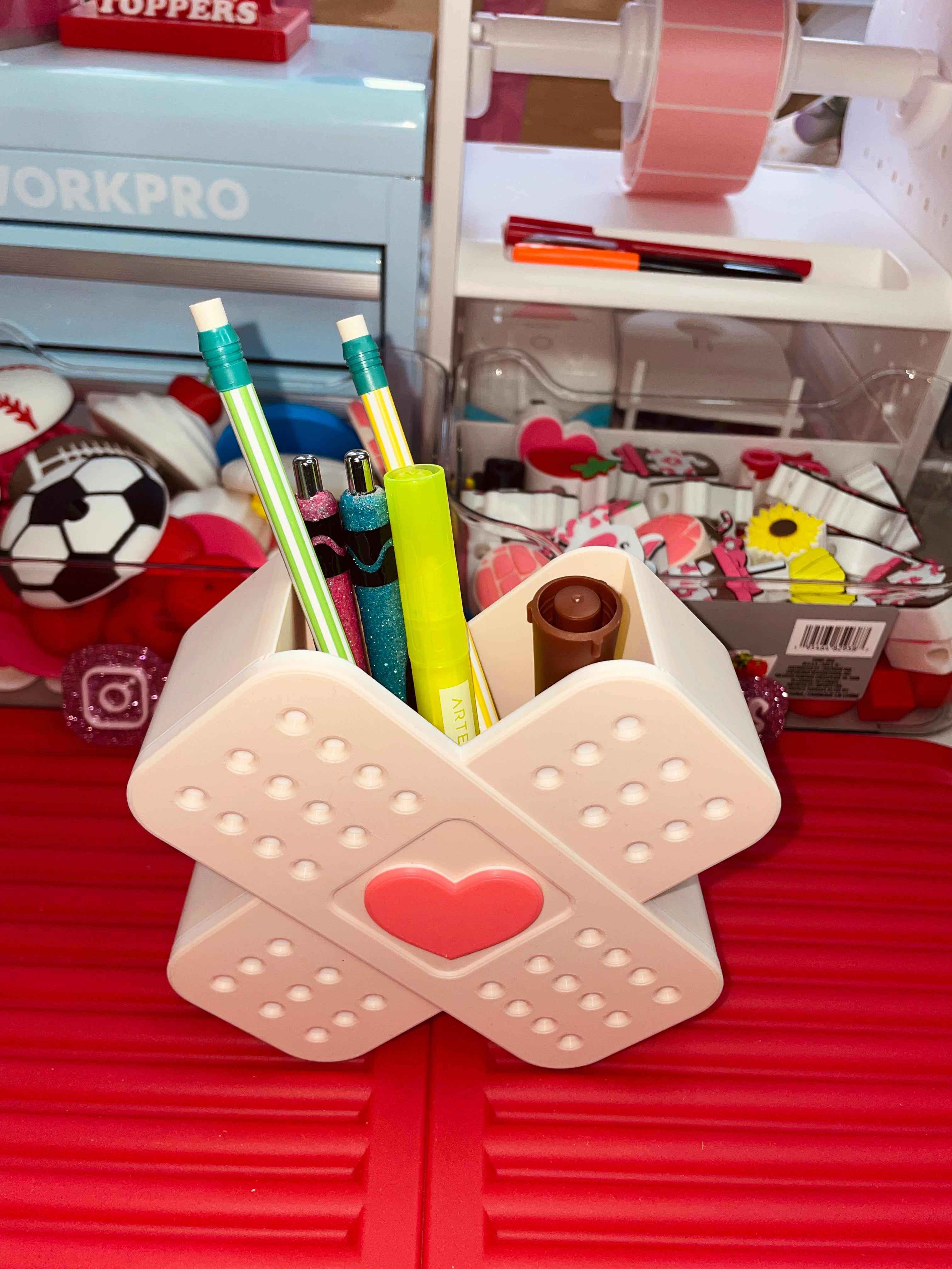 Heart bandage pen/pencil holder