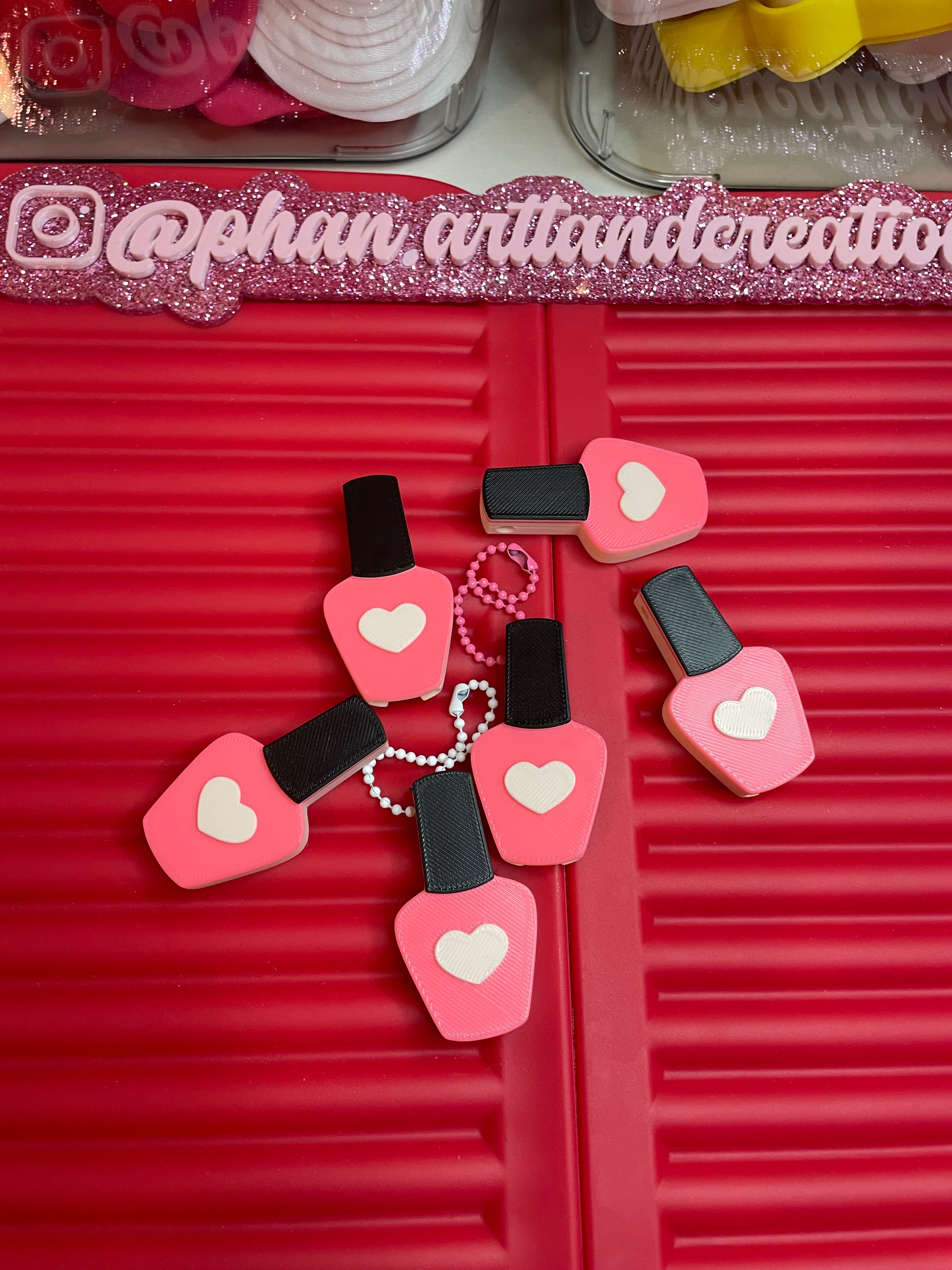 Nail polish can opener/keychain