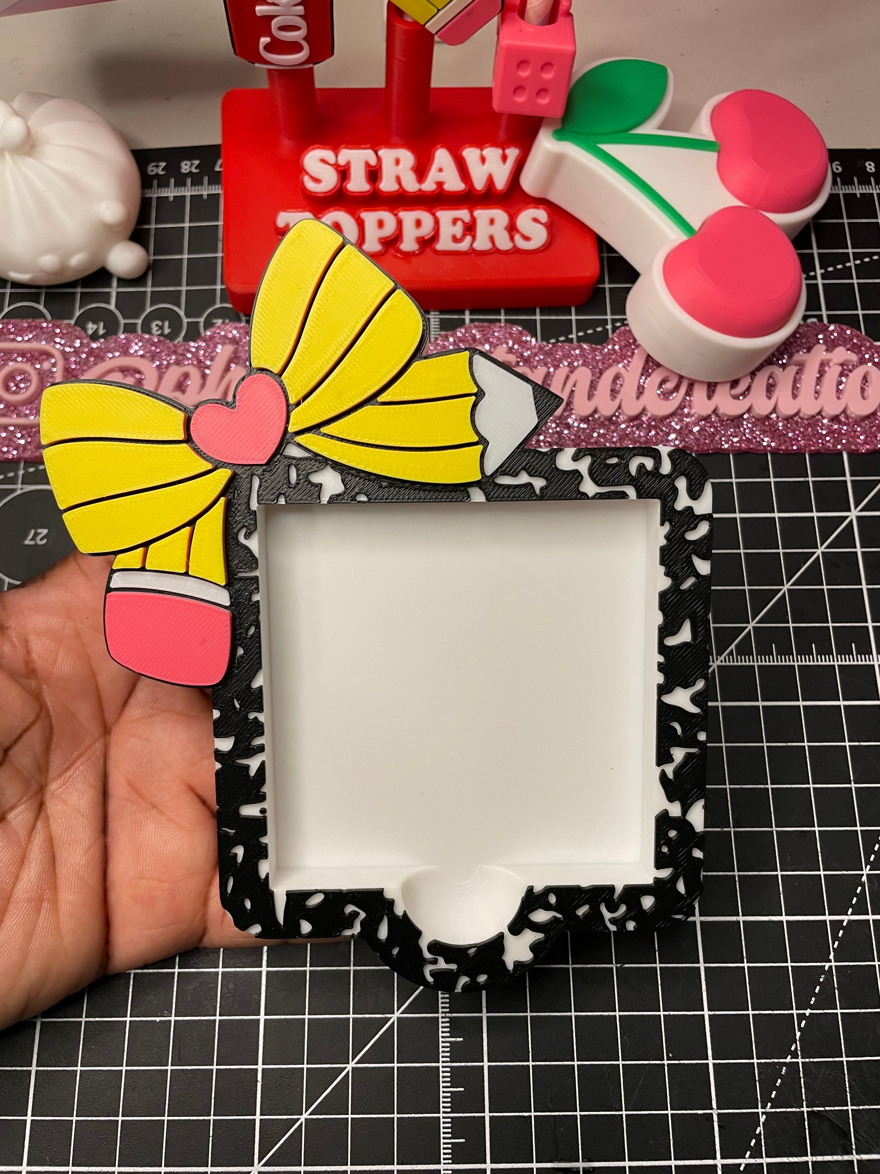 Pencil bow composition sticky note holder