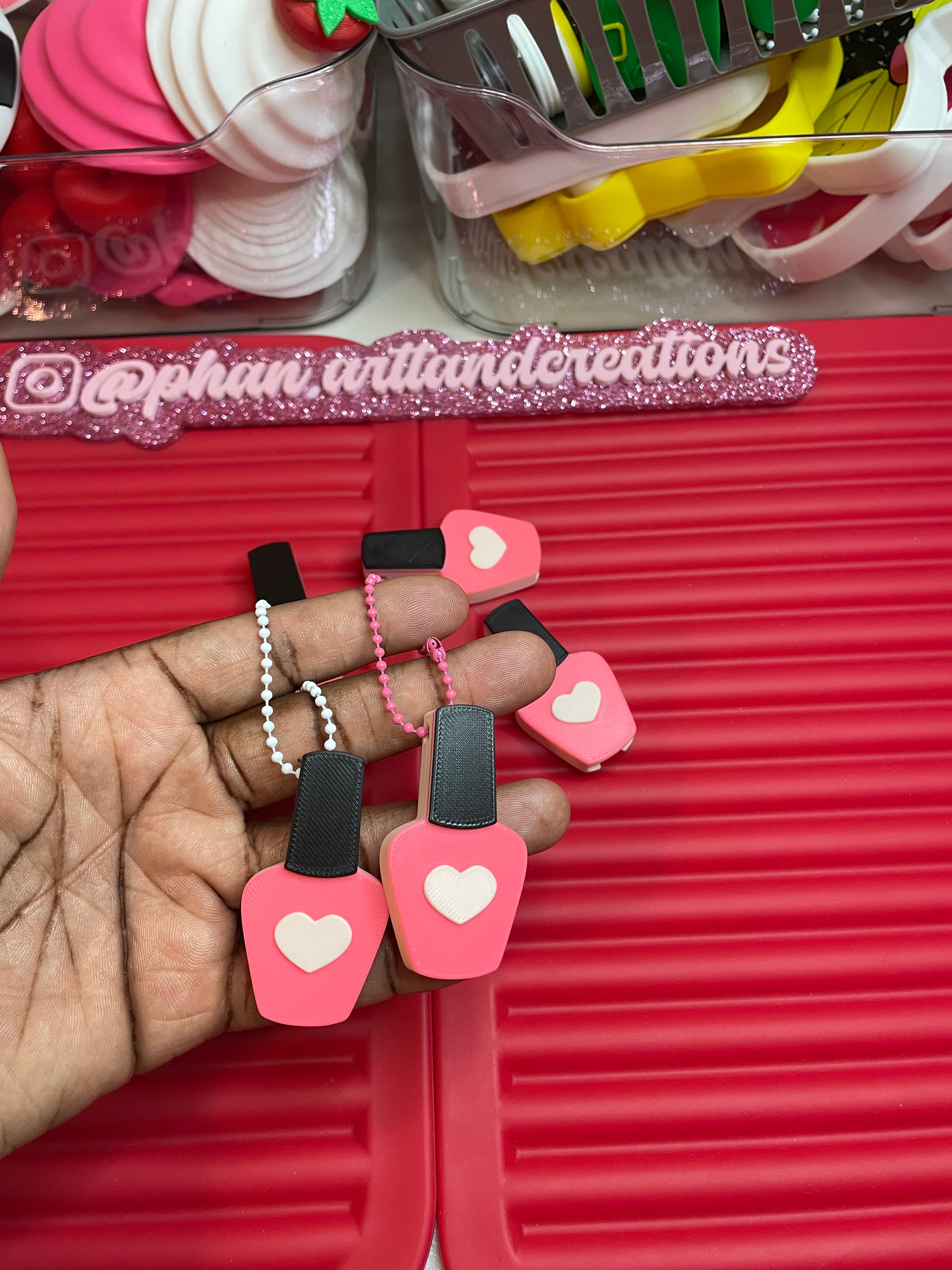Nail polish can opener/keychain